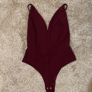 Low cut with lace open back wine colored bodysuit